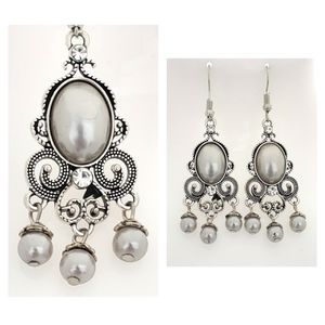 Pearly statement earrings